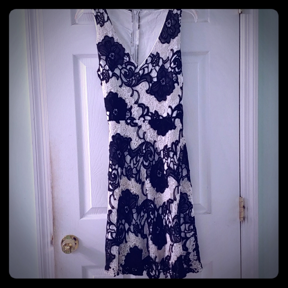 Knee length, form fitted vintage dress